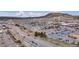 Vast aerial view of shopping center and roads, showing extensive parking and commercial areas at 3129 Open Sky Way, Castle Rock, CO 80109