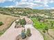 Stunning property featuring a home, gazebo, and meticulously maintained landscaping at 5285 E State Highway 86, Franktown, CO 80116