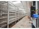 Indoor agricultural setup, featuring rows of shelves, industrial equipment at 5285 E State Highway 86, Franktown, CO 80116