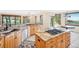 Well-appointed kitchen featuring custom wood cabinetry, granite countertops, and modern appliances at 5285 E State Highway 86, Franktown, CO 80116