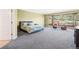 Spacious primary bedroom with large windows offering scenic outdoor views and plenty of natural light at 5285 E State Highway 86, Franktown, CO 80116