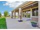 Spacious patio featuring neutral umbrellas, decorative pot plants and outdoor entertaining space at 5285 E State Highway 86, Franktown, CO 80116