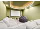Home theater featuring a large screen, comfortable seating, and immersive ambiance for entertainment at 5285 E State Highway 86, Franktown, CO 80116