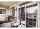 Outdoor patio featuring sliding glass doors and comfortable seating at 1509 S Florence Ct # 218, Aurora, CO 80247