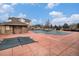 Exterior view of the community pool area, featuring a covered and tarped pool alongside a utility structure at 1509 S Florence Ct # 218, Aurora, CO 80247
