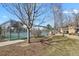 Fenced tennis courts for resident recreation on a clear day at 14001 E Marina Dr # 603, Aurora, CO 80014