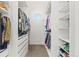 Walk-in closet featuring built-in shelving and ample storage space for clothes and accessories at 6532 S Tempe St, Aurora, CO 80016
