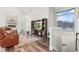 Spacious living room with vaulted ceiling, fireplace, and hardwood floors at 6532 S Tempe St, Aurora, CO 80016