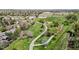 Scenic aerial view featuring a walking path, large open grass space, and a baseball field at 540 Columbine Ave, Broomfield, CO 80020