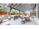 Backyard patio featuring outdoor seating beneath a pergola with views of the yard at 540 Columbine Ave, Broomfield, CO 80020