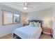 A light-filled bedroom featuring hardwood floors, and ample natural light at 540 Columbine Ave, Broomfield, CO 80020