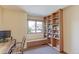 Bedroom featuring natural light, a built-in window bench, and shelves at 540 Columbine Ave, Broomfield, CO 80020