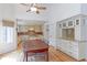 Bright kitchen and dining area with hardwood floors, ceiling fan, and modern appliances at 540 Columbine Ave, Broomfield, CO 80020