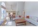 Open concept living area with hardwood floors, tall ceilings, and abundant natural light at 540 Columbine Ave, Broomfield, CO 80020