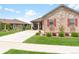 Cozy single-Gathering home featuring manicured lawn, stone accents, and a long driveway at 25049 E Alder Dr, Aurora, CO 80016