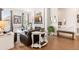 Inviting living room with a fireplace, plush seating, and a staircase leading to the upper level at 25049 E Alder Dr, Aurora, CO 80016