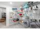 Organized pantry with white wire shelving providing ample storage space for kitchen essentials and more at 25049 E Alder Dr, Aurora, CO 80016