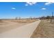 Scenic walking path surrounded by nature, ideal for outdoor recreation and enjoying the peaceful landscape at 10115 W 25Th Ave # 1, Lakewood, CO 80215