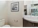 Chic powder room with a contemporary sink and toilet at 3444 Mariposa St, Denver, CO 80211