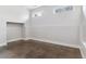 Small empty bedroom with concrete floors and neutral walls at 3444 Mariposa St, Denver, CO 80211