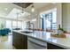 Modern kitchen with white countertops, stainless steel appliances, and an island at 3444 Mariposa St, Denver, CO 80211