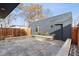 Private backyard patio with modern shed and stone accents at 3444 Mariposa St, Denver, CO 80211