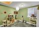 Versatile bonus room with concrete floors, ample storage, and a bright window letting in natural light at 3419 Traver Dr, Broomfield, CO 80023