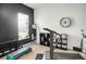 Exercise room with work out equipment, carpeted floor, and large window at 3419 Traver Dr, Broomfield, CO 80023