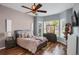 Comfortable main bedroom with bay windows and wood floors at 3419 Traver Dr, Broomfield, CO 80023