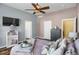 Bright main bedroom featuring hardwood floors and ample closet space at 3419 Traver Dr, Broomfield, CO 80023