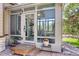 Back patio and sunroom exterior, showcasing outdoor access and natural light at 3419 Traver Dr, Broomfield, CO 80023