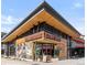 Modern restaurant with a unique architectural design and eye-catching signage at 965 S Jersey St, Denver, CO 80224