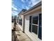 Exterior view of a home featuring blue trim and a sidewalk at 311 Elm St, Lochbuie, CO 80603