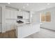Modern kitchen featuring an island, stainless steel appliances, and a window at 6566 N Nepal St, Aurora, CO 80019