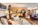Bright living room featuring a fireplace, comfortable seating, and stylish decor at 7865 E Mississippi Ave # 304, Denver, CO 80247