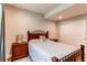 Comfortable bedroom features a decorative wrought iron bed and a double door closet at 3367 New Haven Cir, Castle Rock, CO 80109