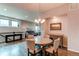 Upstairs dining area featuring a round table and upholstered chairs open to the living area at 3367 New Haven Cir, Castle Rock, CO 80109