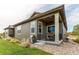 Charming home exterior with patio, grill, lush lawn, and well-maintained landscaping at 3367 New Haven Cir, Castle Rock, CO 80109