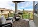Relaxing patio with comfortable seating and a view of the surrounding neighborhood at 3367 New Haven Cir, Castle Rock, CO 80109