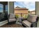 Outdoor patio features comfortable seating perfect for relaxation with a view at 3367 New Haven Cir, Castle Rock, CO 80109
