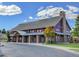 The community recreation center has stone pillars and a gray shingle roof at 3367 New Haven Cir, Castle Rock, CO 80109
