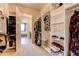 Spacious walk-in closet with custom shelving and storage solutions for organized living at 3367 New Haven Cir, Castle Rock, CO 80109