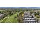 Stunning aerial view of condo community backing to golf course with mountain views at 6730 W 84Th Cir # 96, Arvada, CO 80003
