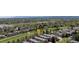 Beautiful aerial view of townhomes along a golf course, boasting lush green spaces and scenic surroundings at 6730 W 84Th Cir # 96, Arvada, CO 80003