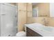 Bathroom featuring a shower stall, modern vanity, and a large mirror for a refreshed space at 6730 W 84Th Cir # 96, Arvada, CO 80003