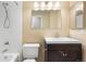 Bathroom with a shower and tub combination, sleek vanity, and well-lit mirror for convenience at 6730 W 84Th Cir # 96, Arvada, CO 80003