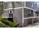 View of townhouses featuring balconies, garages, and well-maintained landscaping enhancing curb appeal at 6730 W 84Th Cir # 96, Arvada, CO 80003