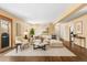 Inviting living room with ample natural light and open access to the staircase at 6730 W 84Th Cir # 96, Arvada, CO 80003