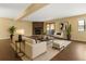 Comfortable living room featuring a fireplace, neutral tones and stylish decor at 6730 W 84Th Cir # 96, Arvada, CO 80003