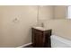 Well-lit powder room with an updated vanity and mirror offering a fresh and functional space at 6730 W 84Th Cir # 96, Arvada, CO 80003